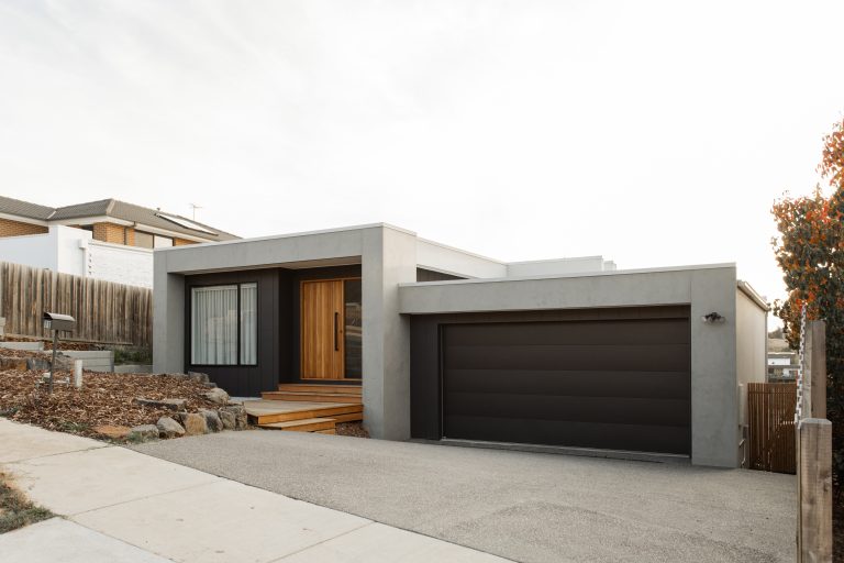 Highton New Build By Fox Building Group, A Custom Home Showcasing Panoramic Views And Modern Design For Luke And Miranda.