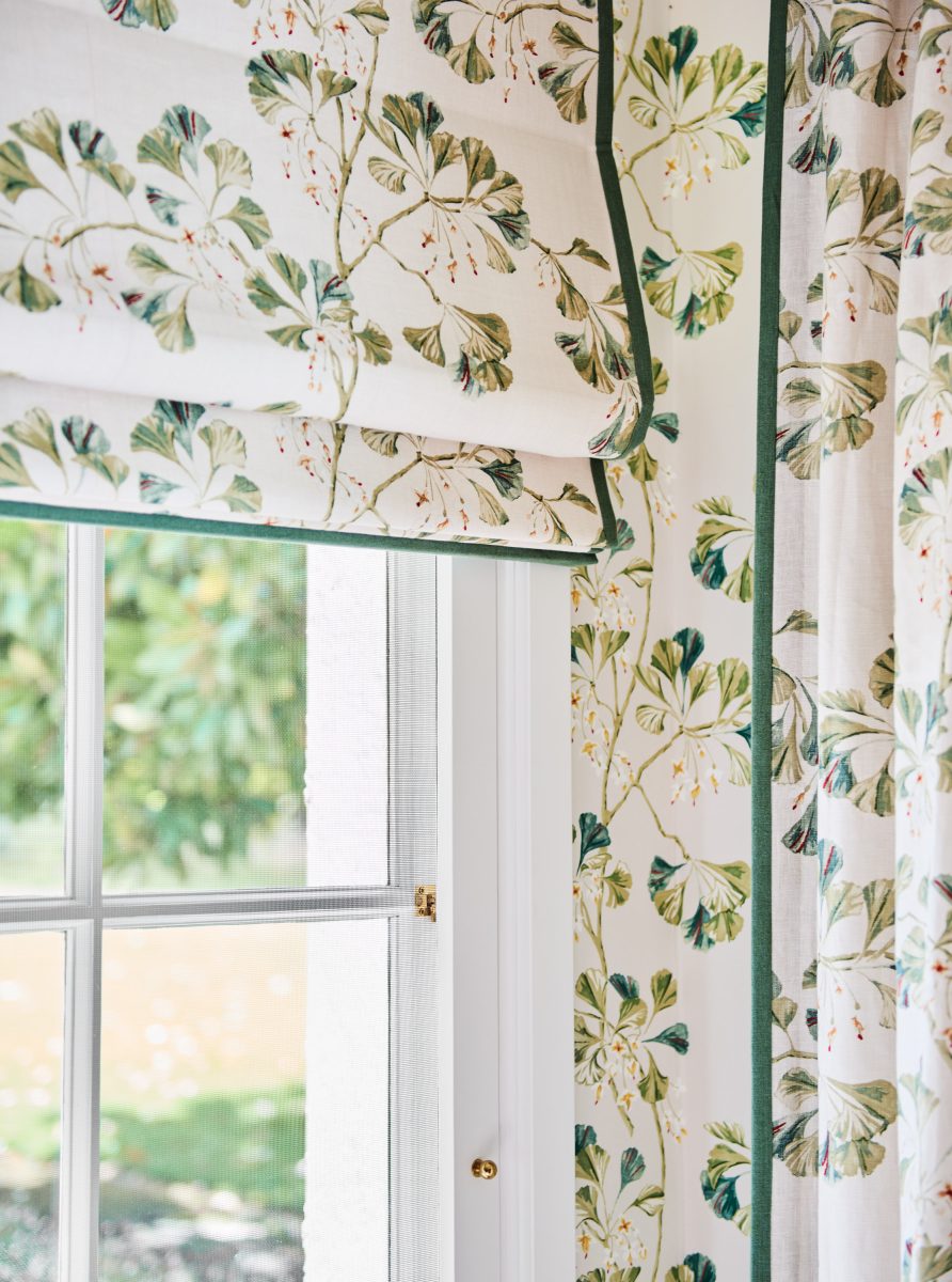 Detailed View Of Roman Blinds And Curtains In Colefax And Fowler &Apos;Greenacre&Apos; Floral Fabric With Dark Green Piping, Perfectly Matched To The Floral Wallpaper.