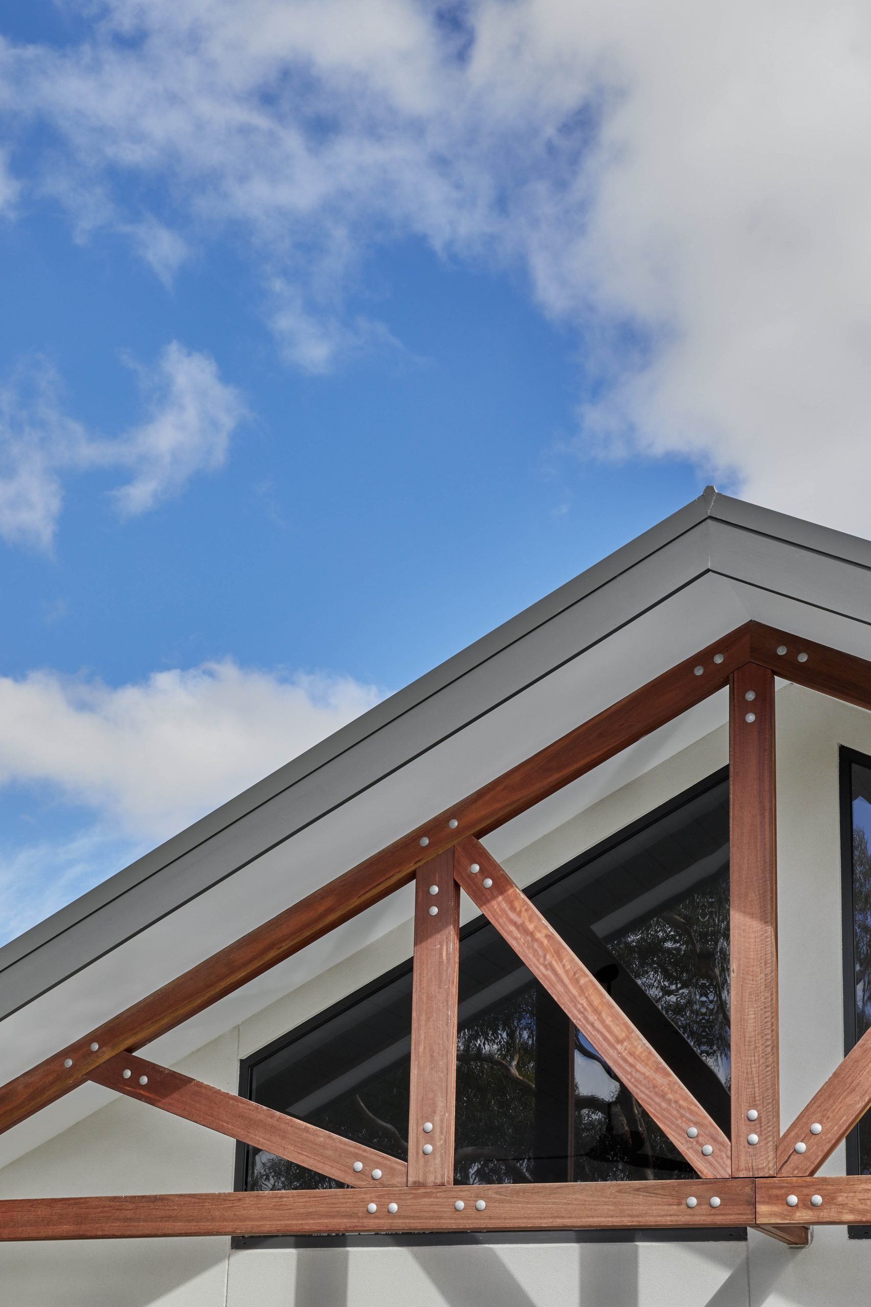 Stained Timber Truss Detail On The Home&Apos;S Rendered Front Facade