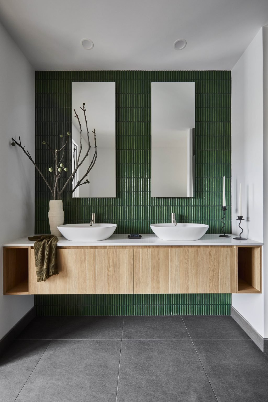 Main Ensuite Bathroom With Fluted Bottle-Green Tile And Twin Freestanding Vanities