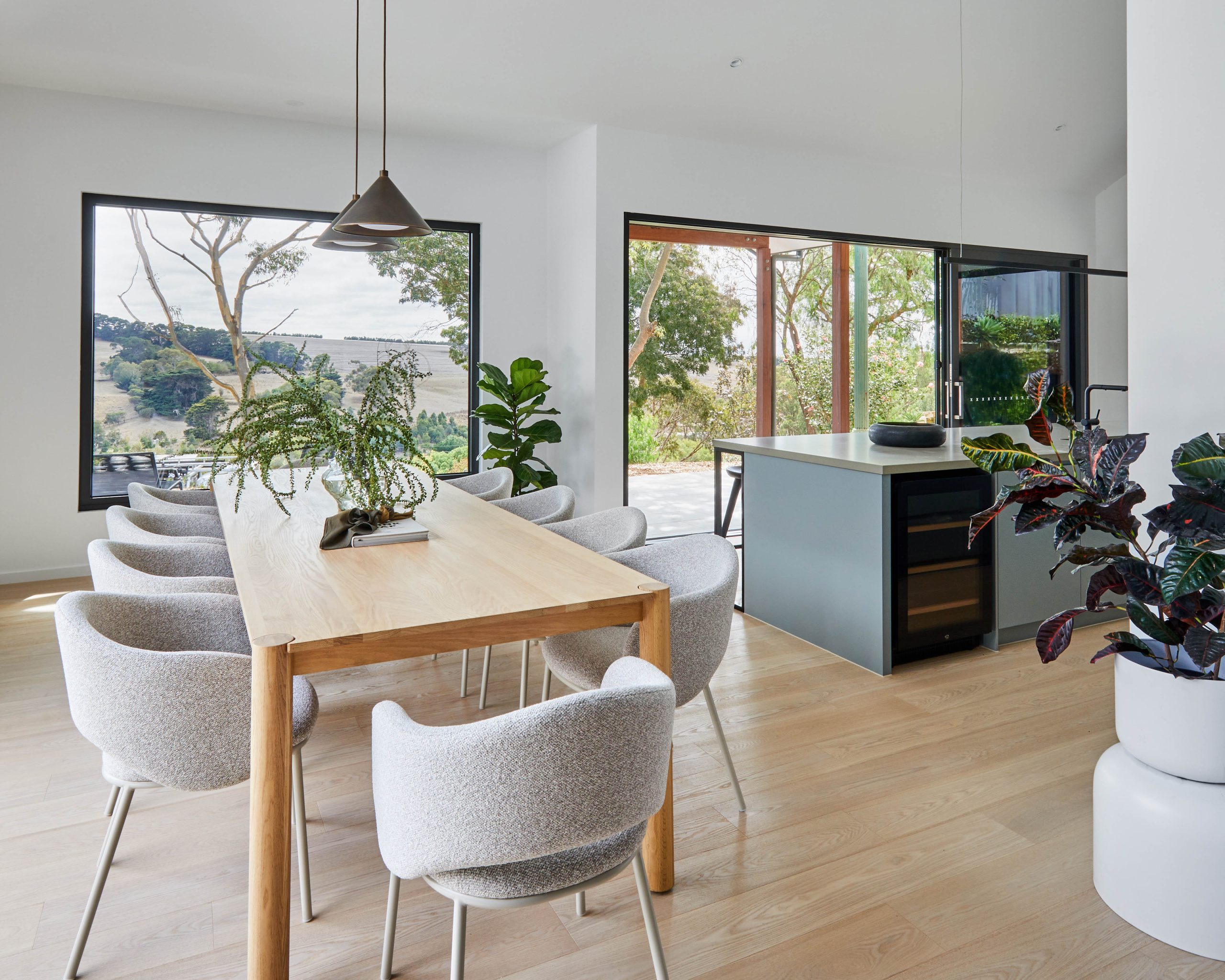 Kitchen Island Bench Opening Onto The Dining Area And Internal Courtyard