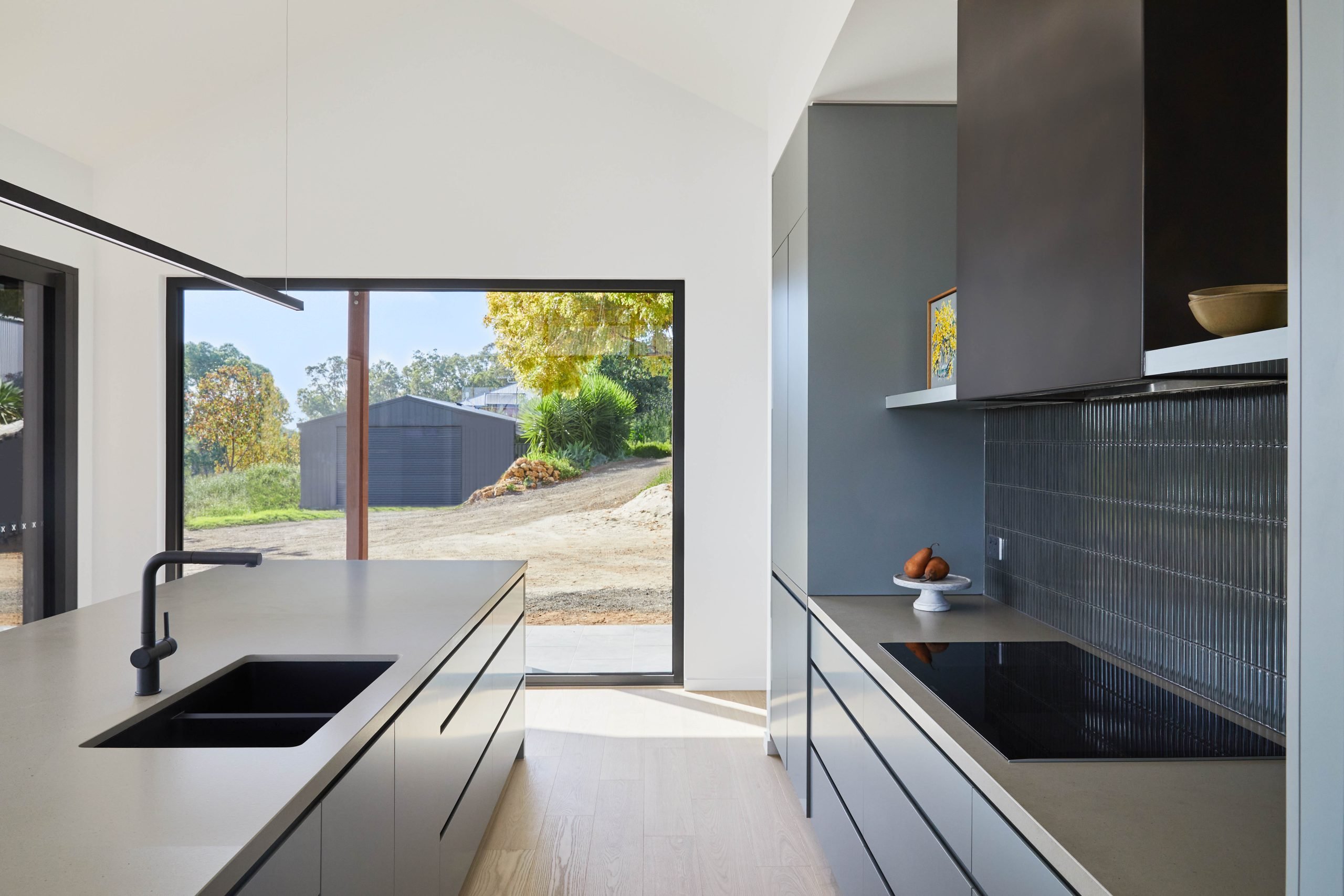 Stone Kitchen Benchtop Detail Lit By Northern Natural Light
