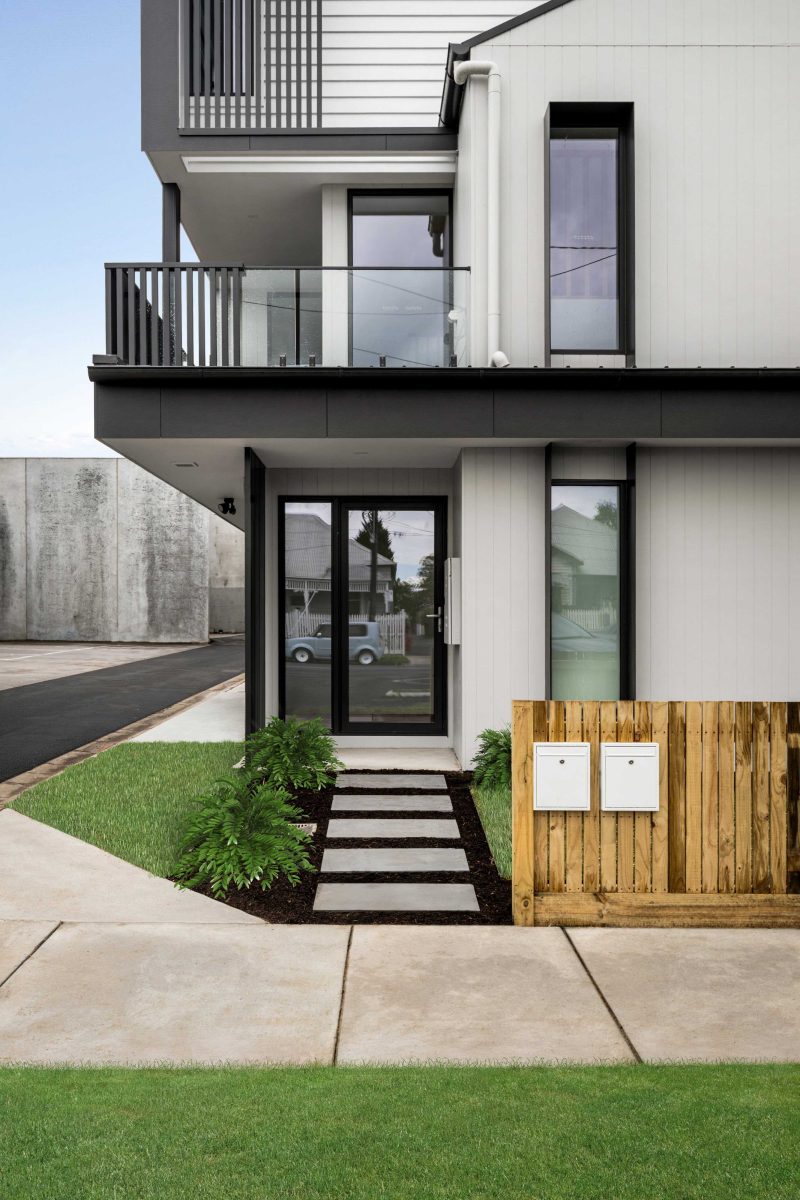 Townhouse Development South Geelong – Full Street Elevation Of The Two Townhouses With Garages And Brick Pillar Fence Remnant