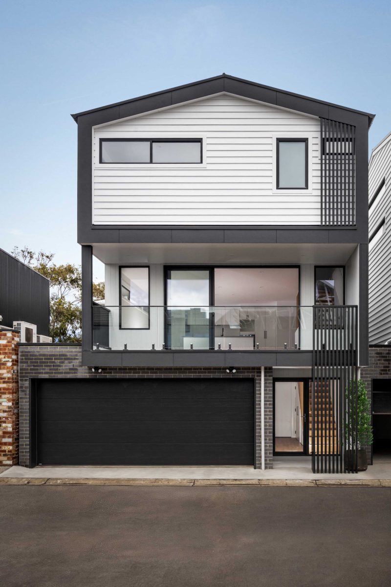 Townhouse Development South Geelong – Close-Up Of Charcoal Vertical Batten Cladding Beside The Front Entry Door