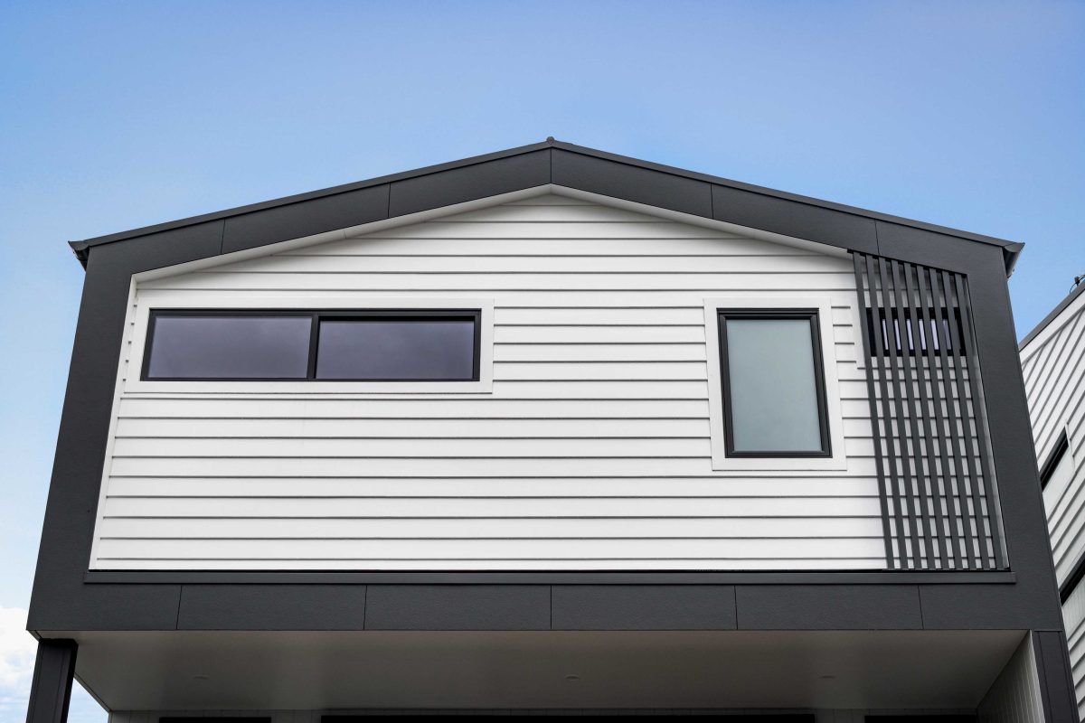 Townhouse Development South Geelong – Low-Angle Detail Of Vertical Batten Cladding And Gable Roofline