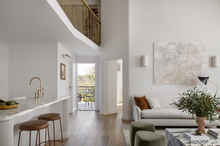 Open-Plan Kitchen, Hallway And Double-Height Living Room With Mezzanine Library In The Award-Winning Carlton Renovation By Fox Building Group.